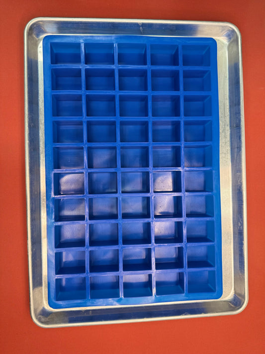 Blue silicone mold on a baking tray