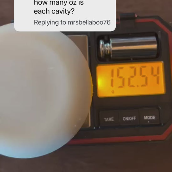 a scale showing the weight of a round puck soap 